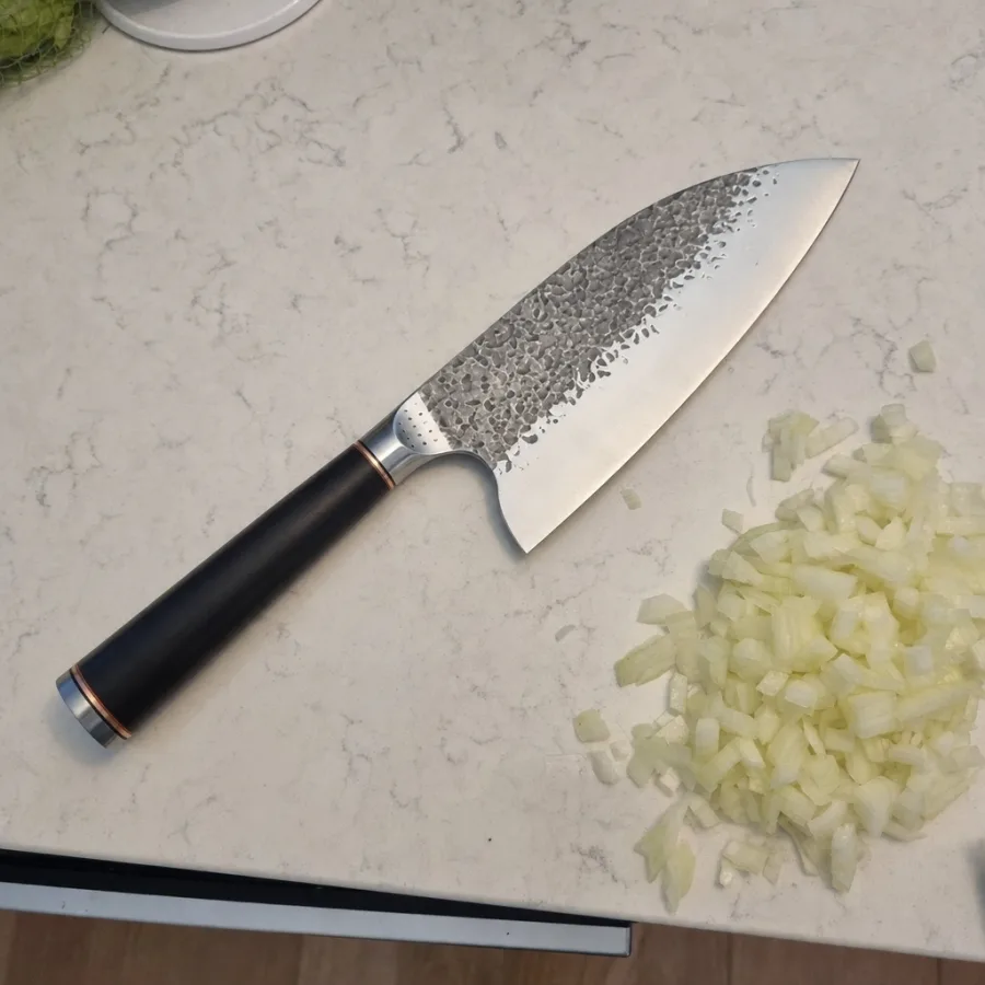 Customer photo: overhead on a marble counter beside diced onion